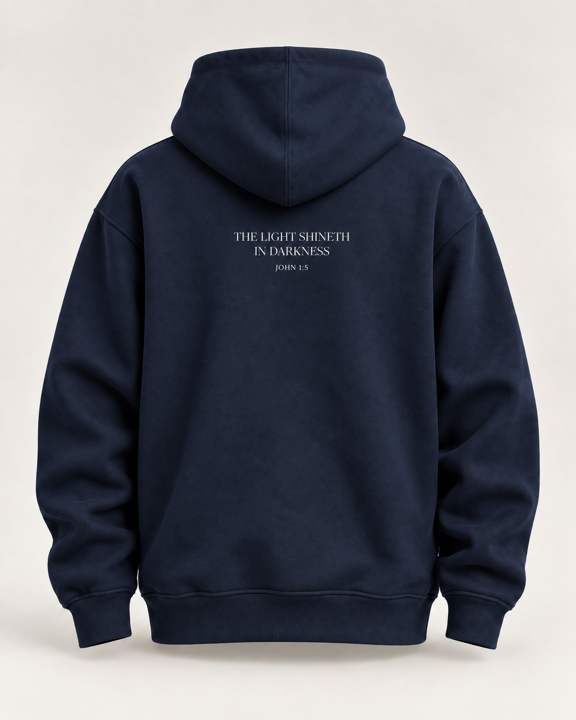 Back view of OADG Heavy Hoodie with John 1:5 artwork